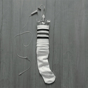 Image of a tube sock with IV bag as an early hydration bladder.
