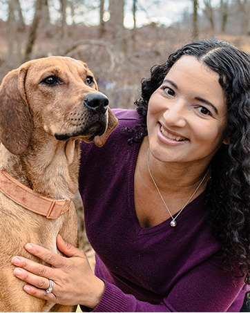 founder Julie Napolitano with her hound mix rescue dog